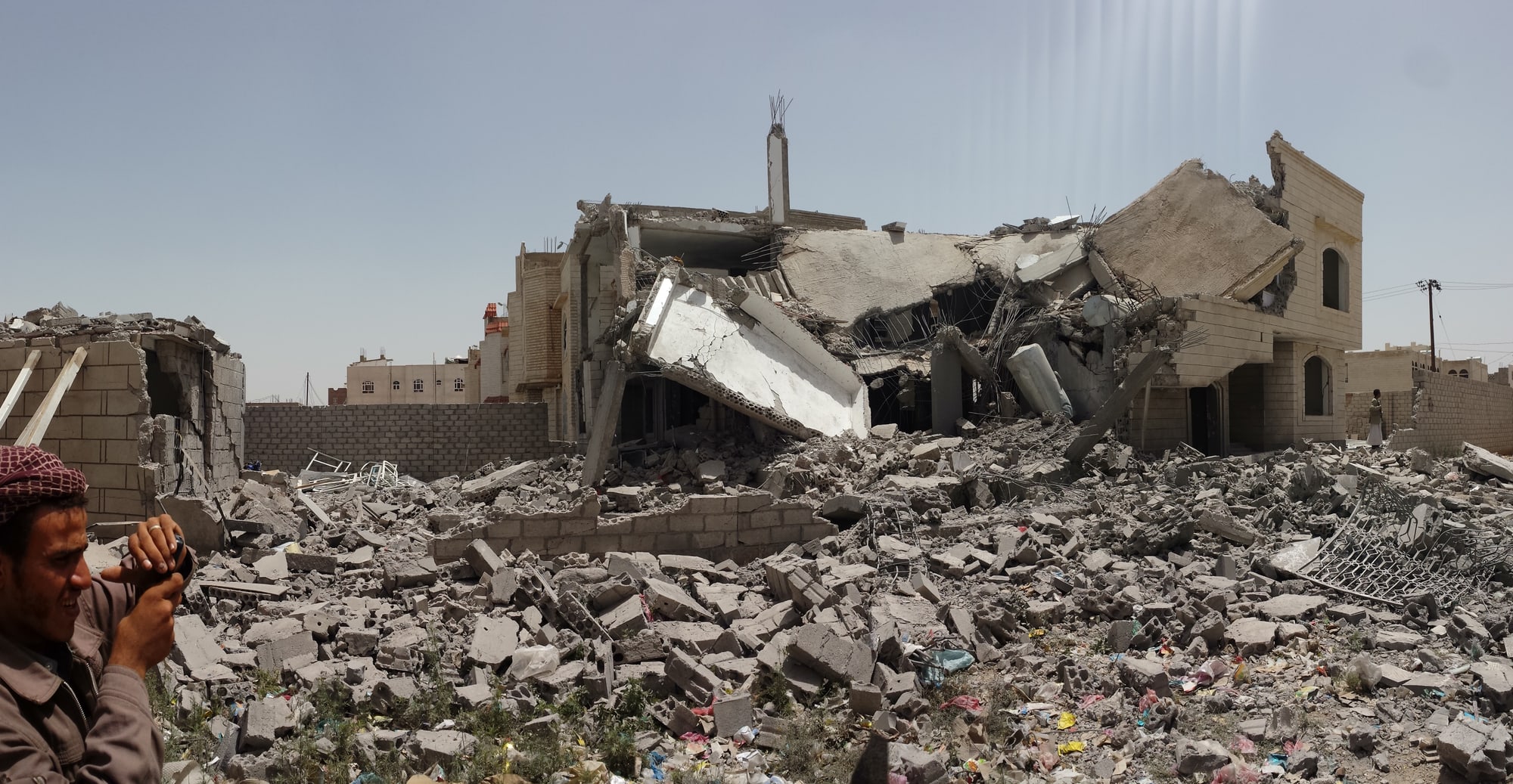 A house reduced to slabs of concrete and rubble in a Sanaa neighbourhood.