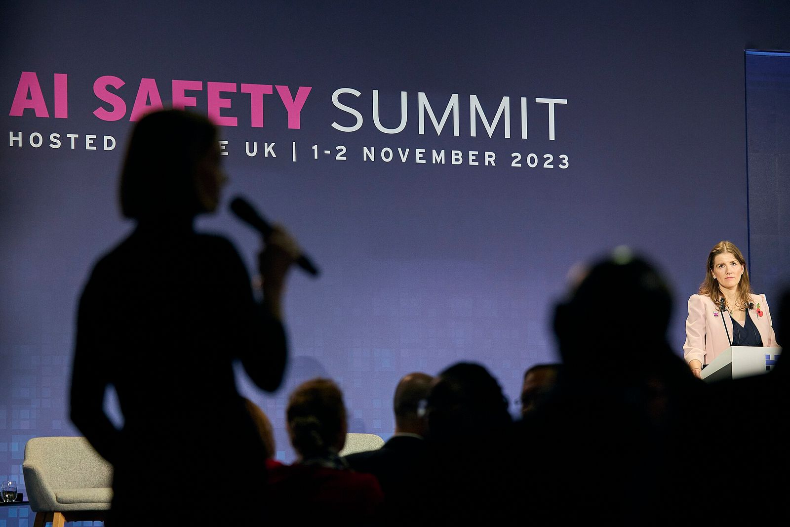 Delegates seated around a conference table at the AI Safety Summit at Bletchley Park