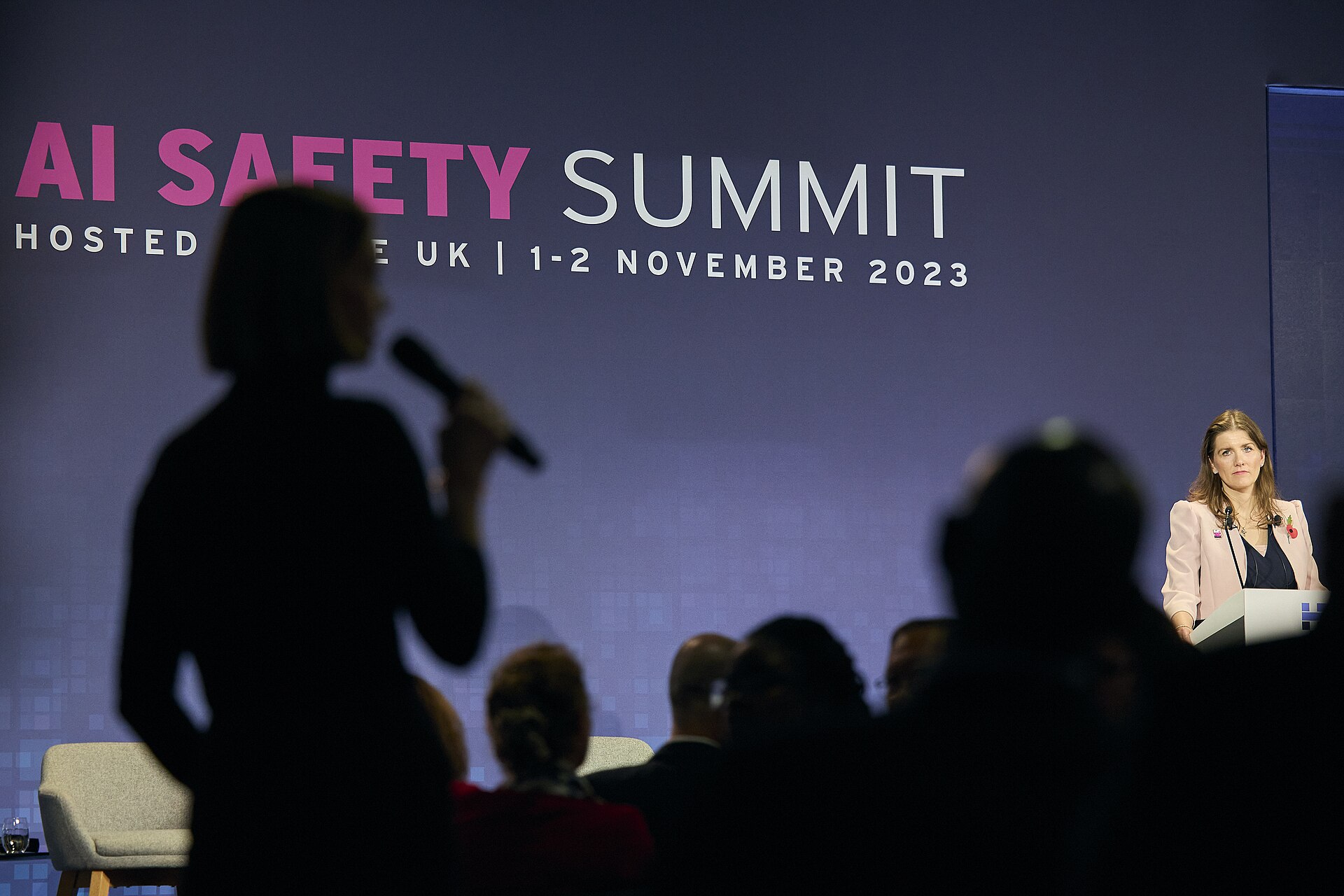 Delegates seated around a conference table at the AI Safety Summit at Bletchley Park
