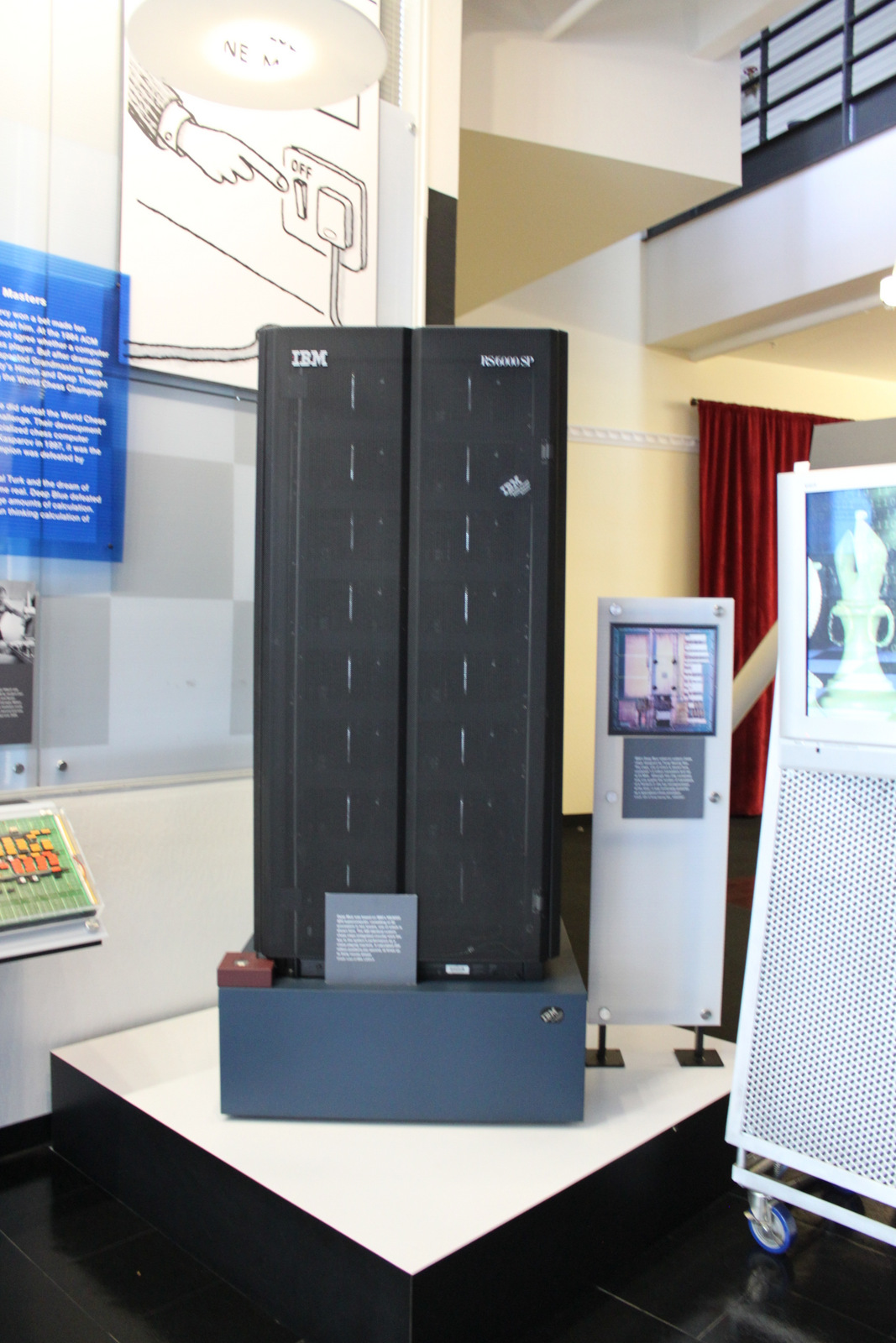 A tall black cabinet of IBM's Deep Blue computer on display in a museum