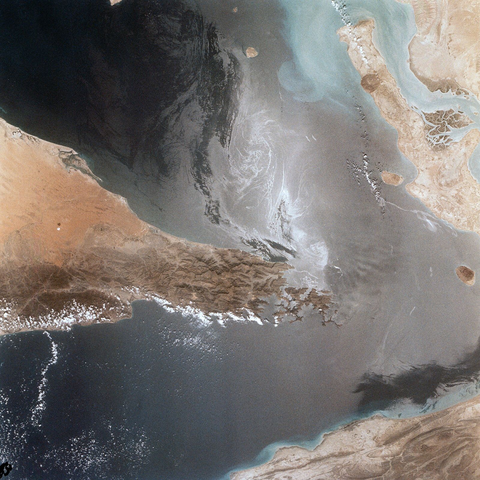 The Strait of Hormuz seen from space, with the Musandam peninsula and the Iranian coast