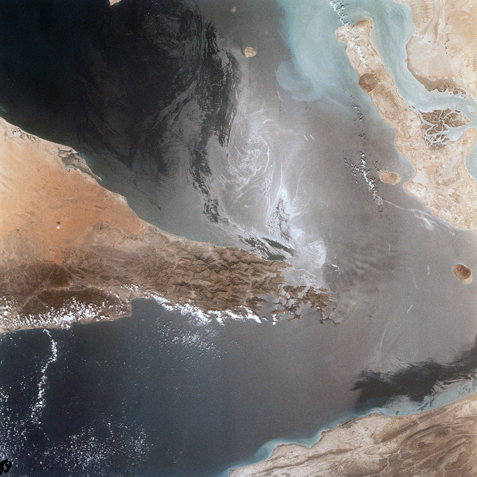 The Strait of Hormuz seen from space, with the Musandam peninsula and the Iranian coast