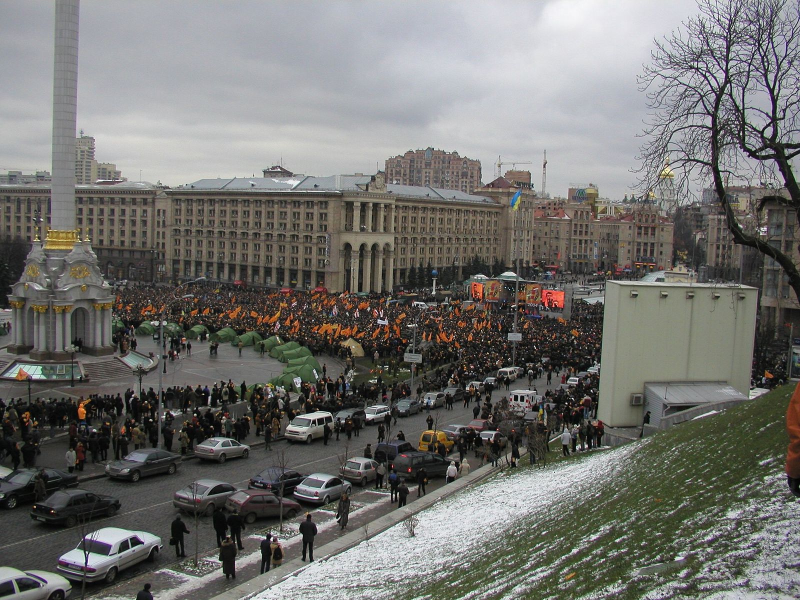 A large crowd with orange flags on Independence Square in Kyiv