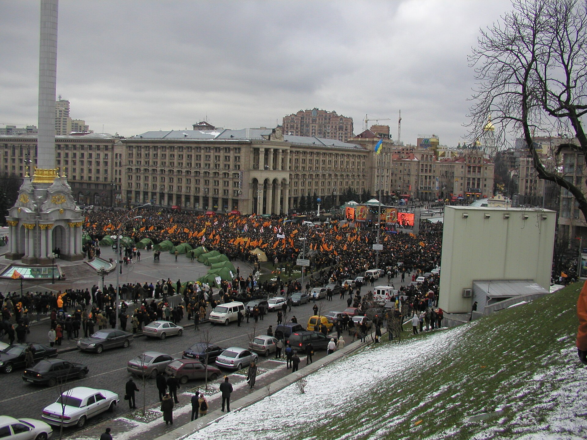 A large crowd with orange flags on Independence Square in Kyiv